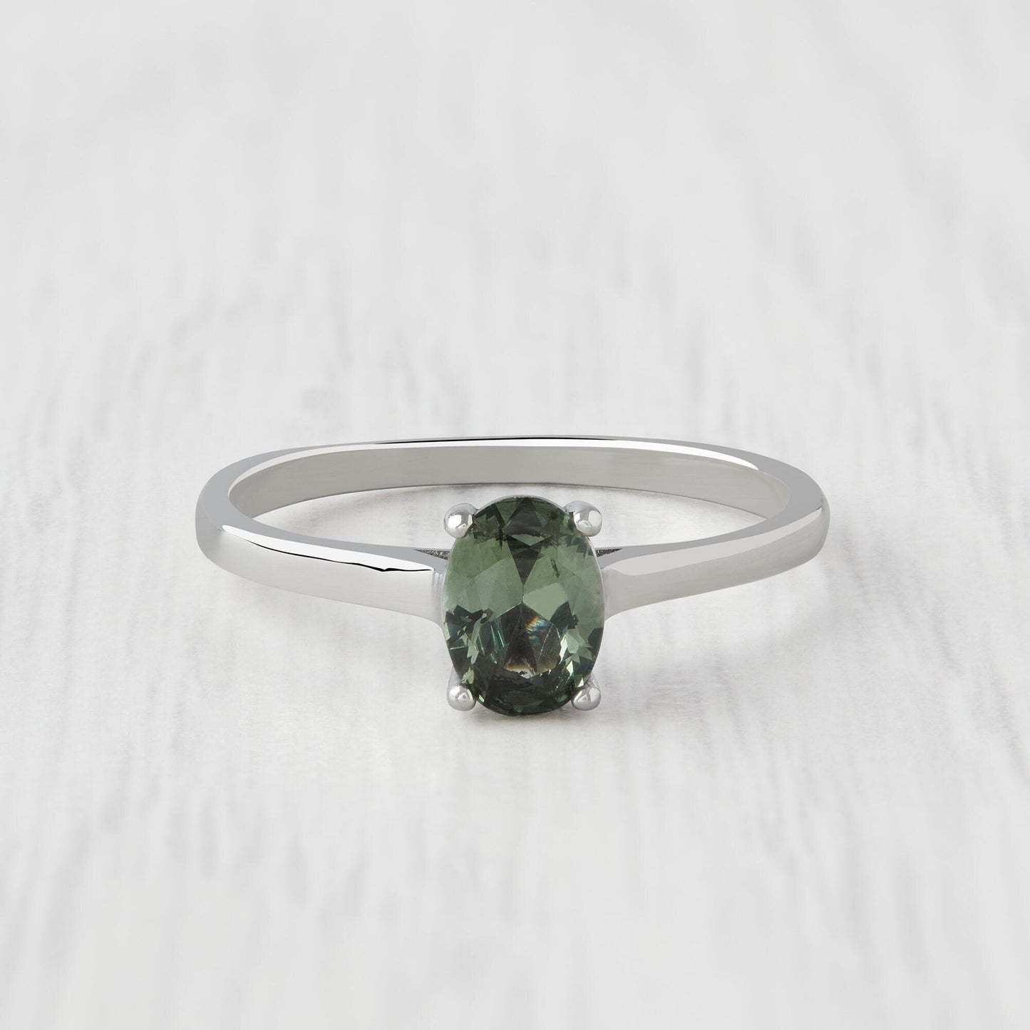 0.7ct Oval Cut Green Sapphire Solitaire cathedral ring in Titanium or White Gold