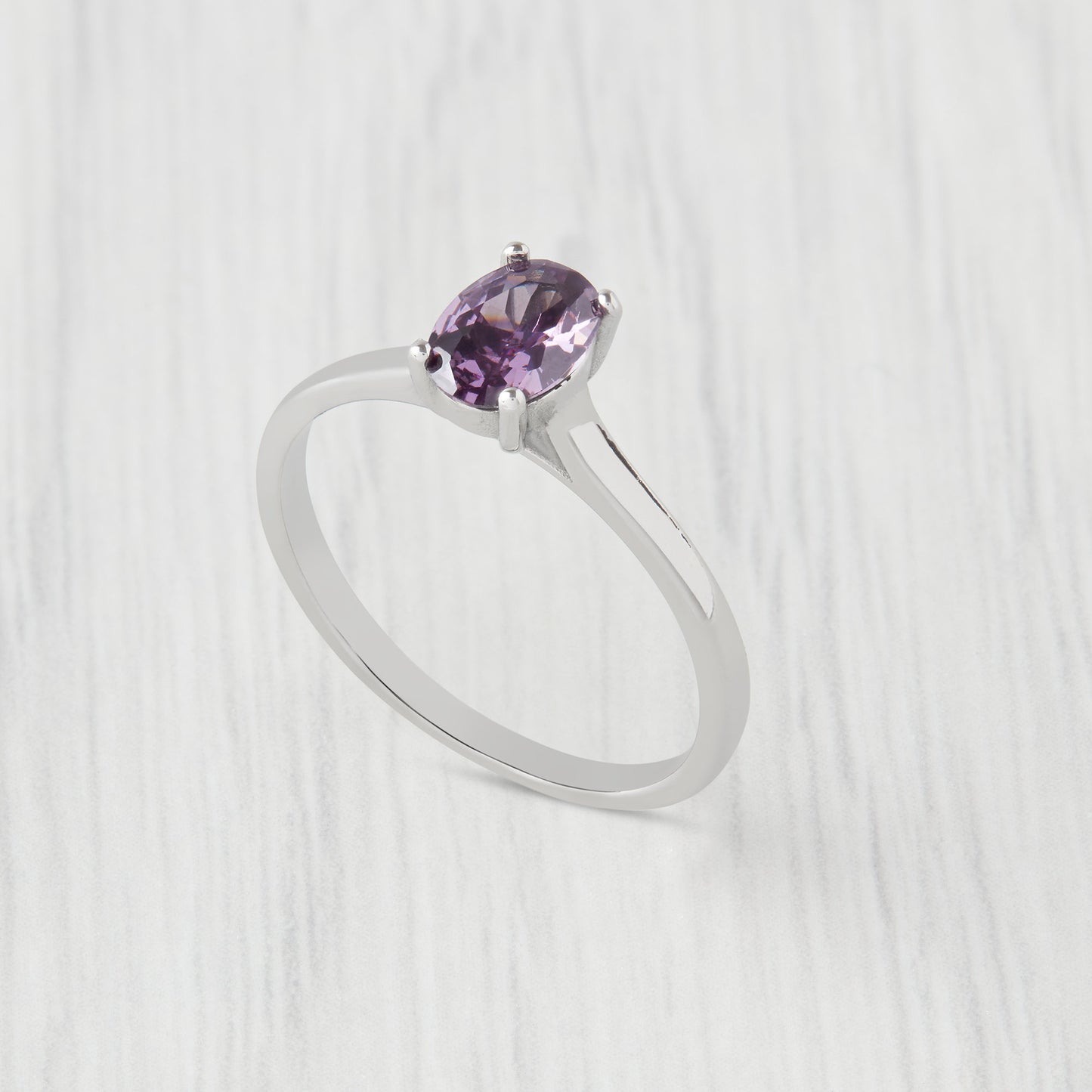 0.7ct Oval Cut Amethyst Solitaire cathedral ring in Titanium or White Gold