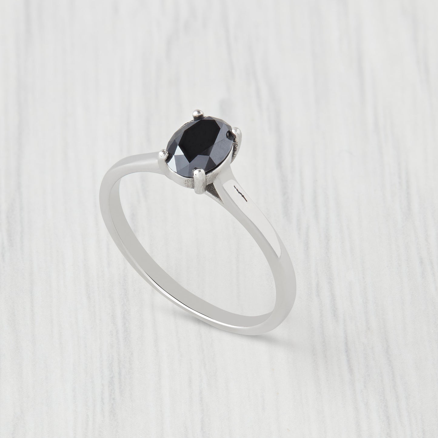 0.7ct Oval Cut Black Moissanite Solitaire cathedral in Titanium or White Gold
