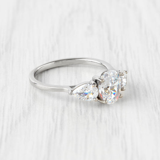 CRUSHED ICE CUT Genuine moissanite Oval & pear cut 3 stone Trilogy Ring in White Gold or Titanium  - engagement ring - handmade ring