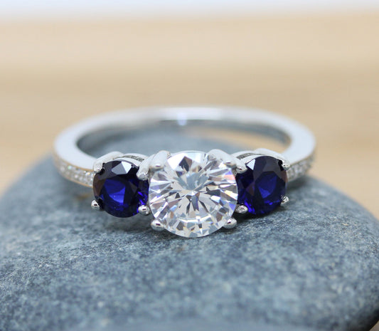 Blue Sapphire and Man Made Diamond Simulant Trilogy 3 stone Ring - available in white gold or sterling silver - engagement ring